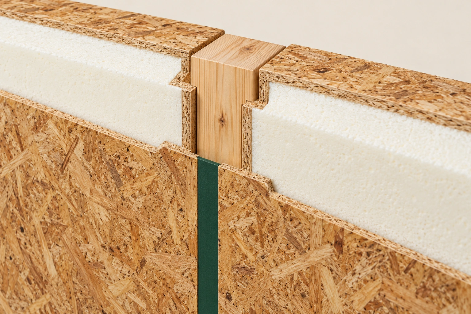 The joint member and face seal serve different jobs. A timber joint member joins neighbouring wood-skin foam-core panels. A sealing strip is visible on the lower exposed face of the joint; it illustrates a separate air-control job without exposing the full concealed seal route.